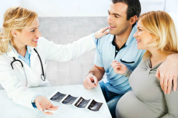 a couple visiting a fertility doctor