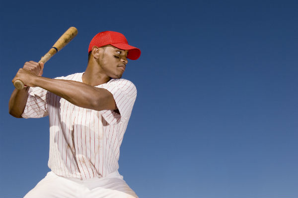 man playing baseball