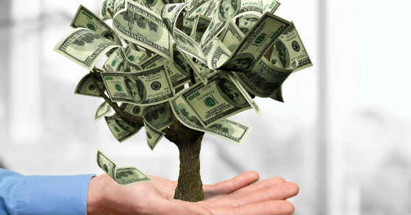 a money tree growing from a hand