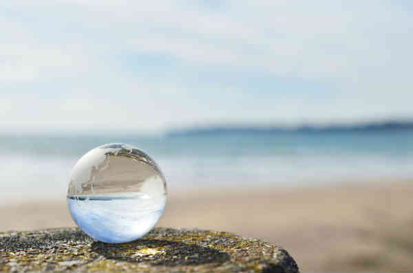 a glass orb placed to overlook the beach