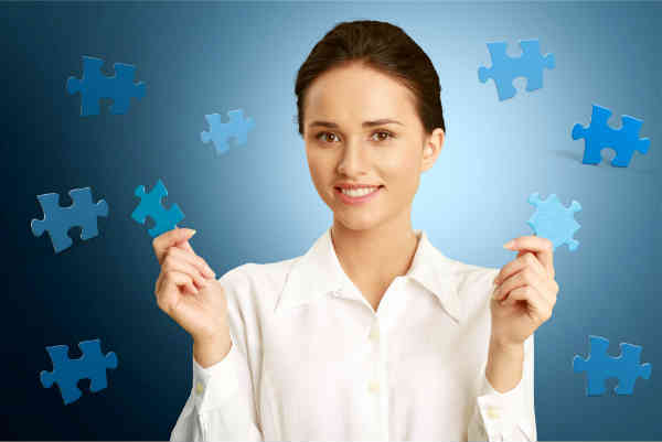 woman holding puzzles