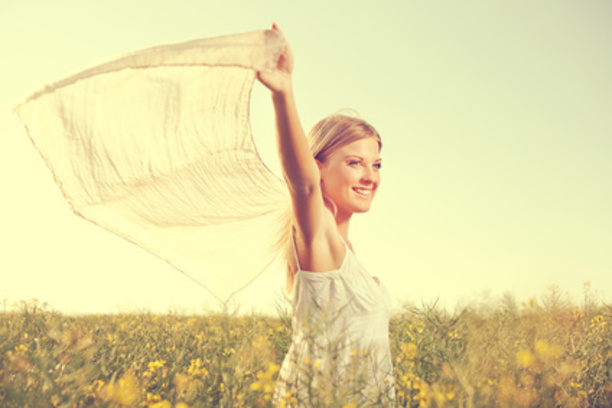 woman enjoying herself on field